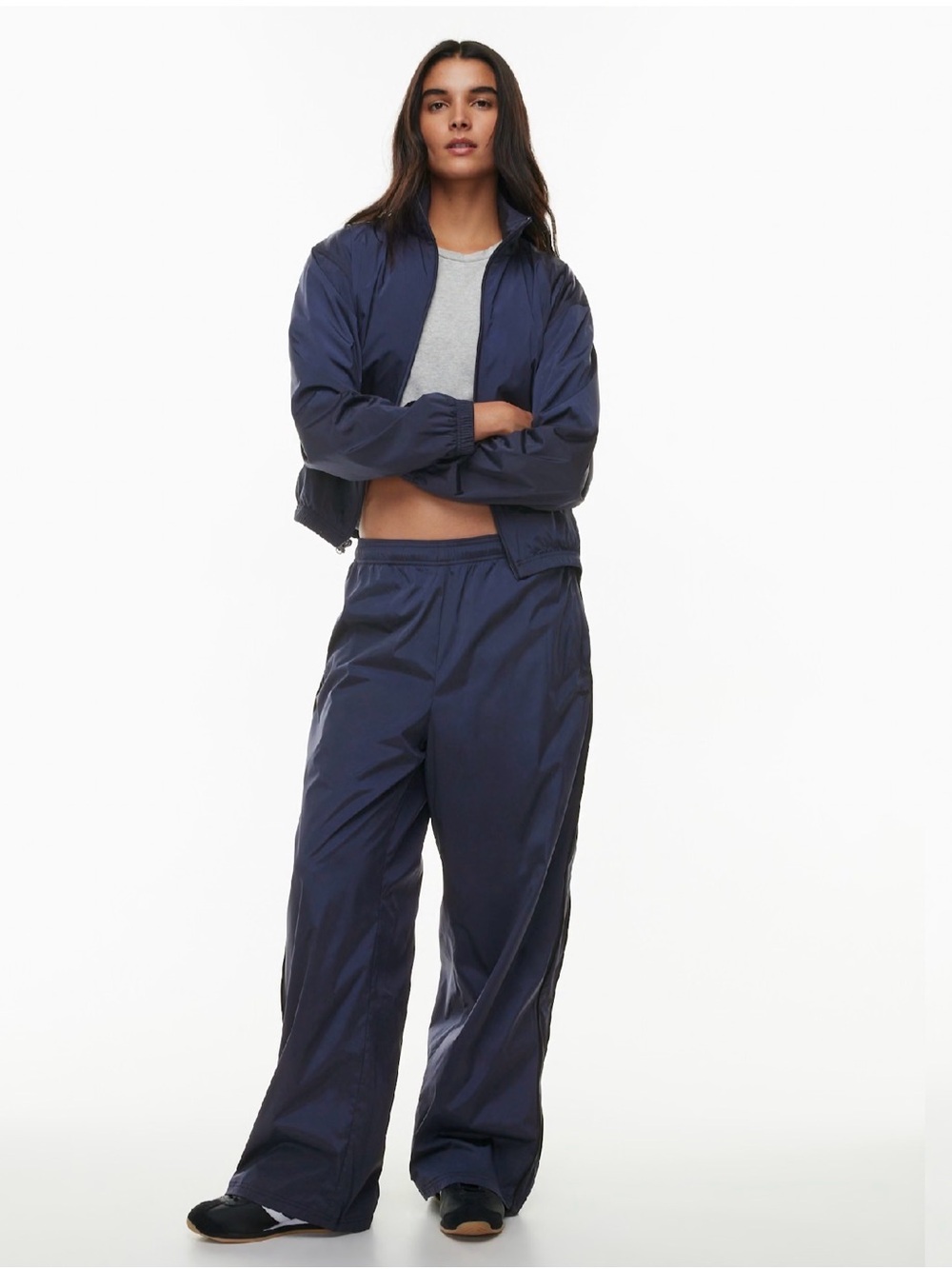 Aritzia TNA Baby blue track pants with black piping details